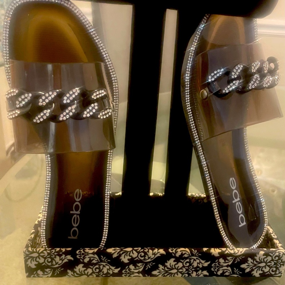 A pair of black sequined Bebe slipper flats